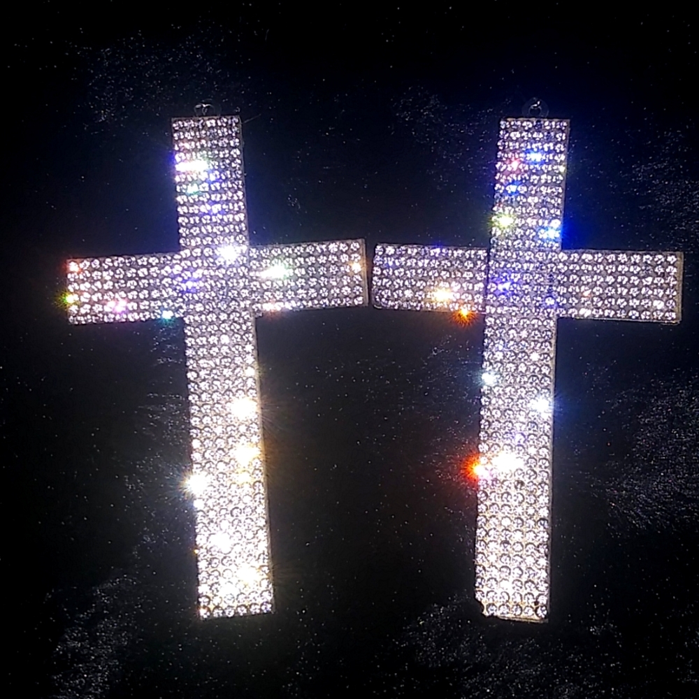 Beautiful Cz diamond earrings. Lg in size. Slight discoloration on one gem.